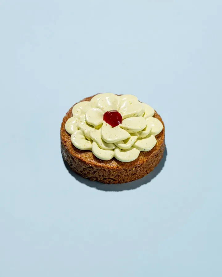 Bad and Boujee cookie: pistachio ganache, raspberry compote, brown butter cookie base with pistachio paste