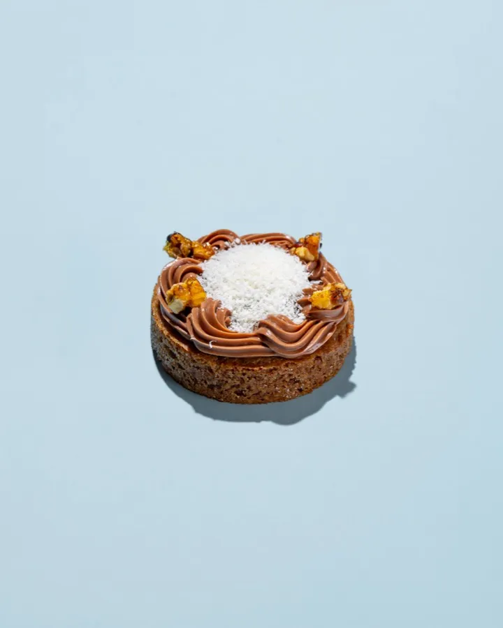 Berghain cookie: brown butter cookie base, brownie, milk chocolate ganache, german chocolate cake filling, desiccated coconut, candied walnut